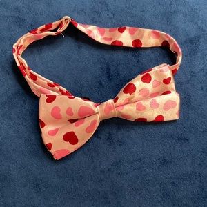 Pink heart pattern bowtie. Red pink hearts love Valentine’s Day. One size